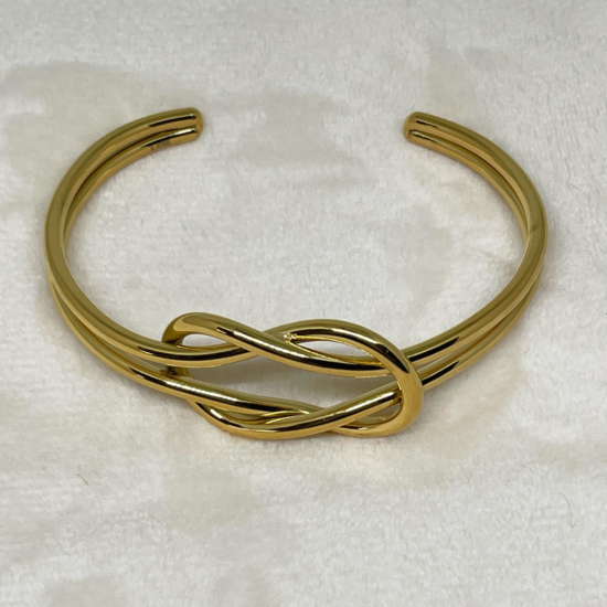 Knoop RVS goud